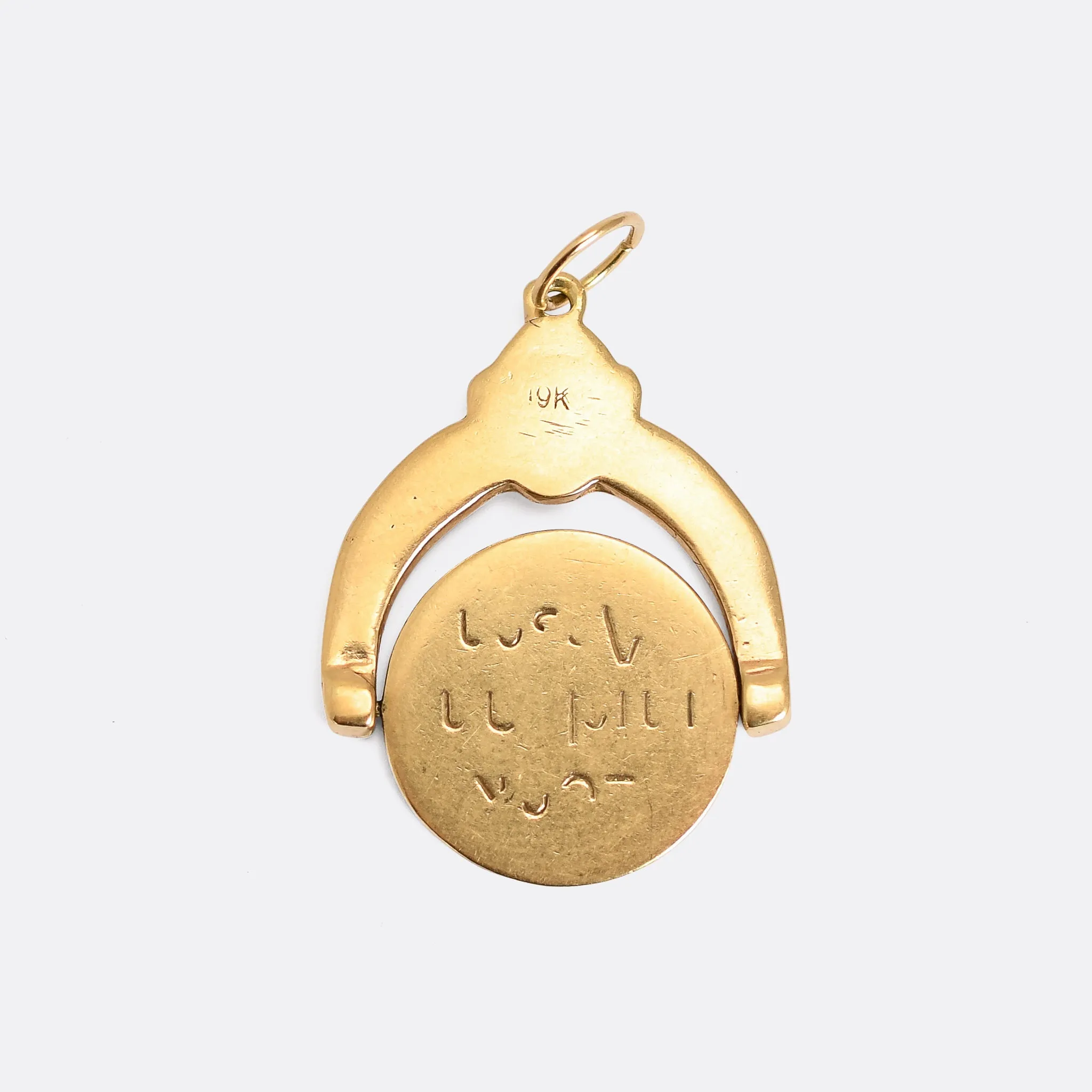 1950's Gold "Kiss My Ass" Spinner Pendant
