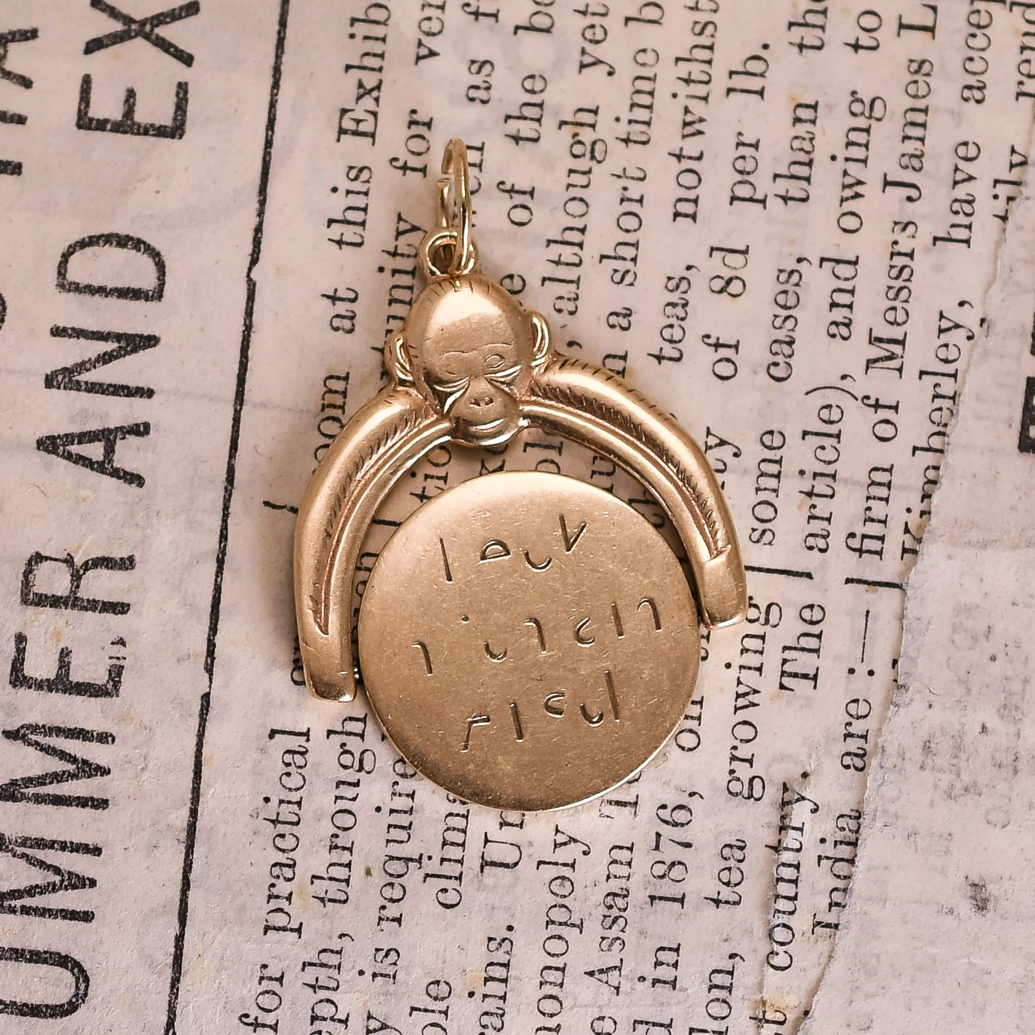 1950's Gold "Kiss My Ass" Spinner Pendant