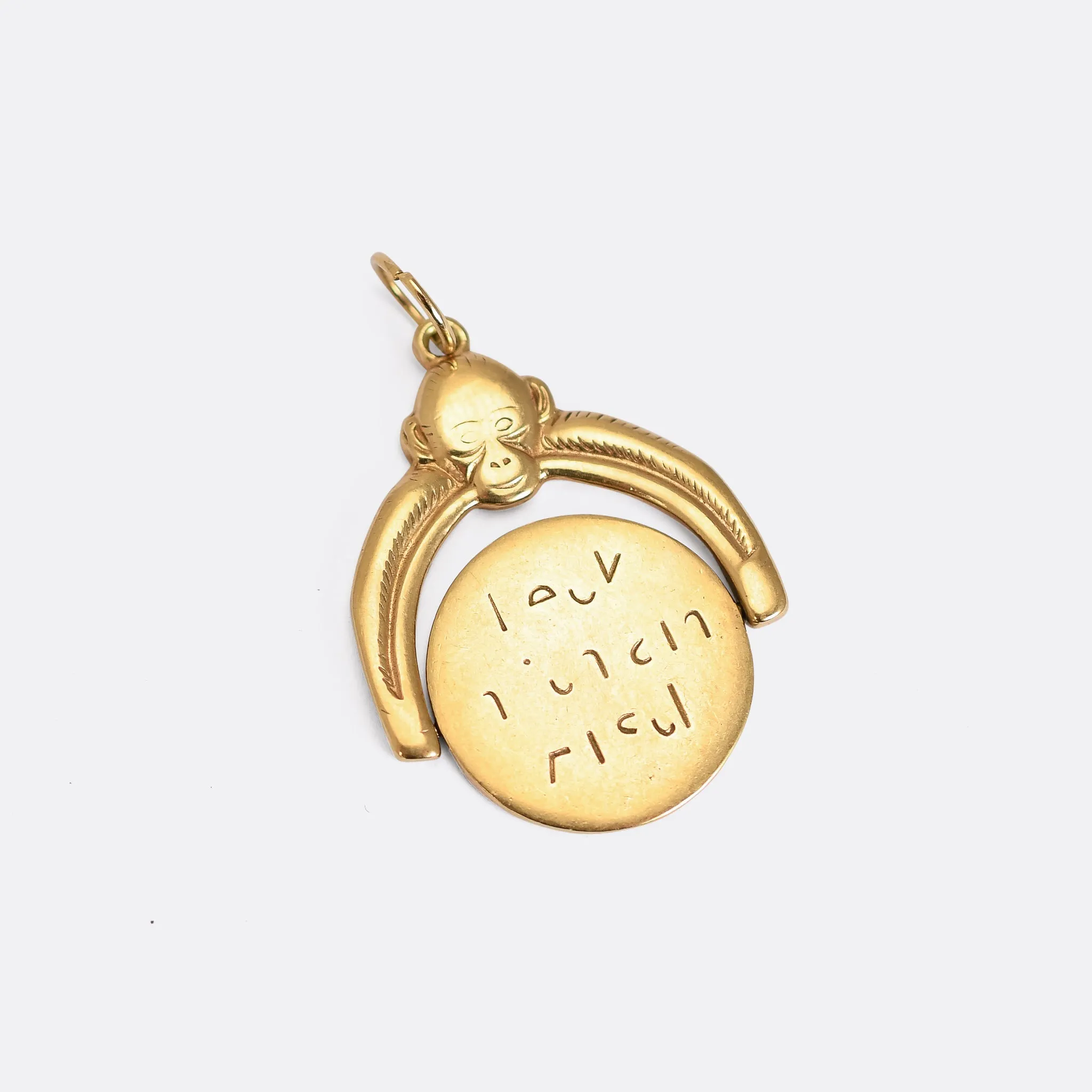 1950's Gold "Kiss My Ass" Spinner Pendant