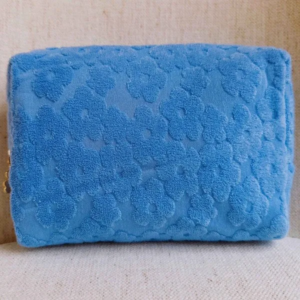 Embossed Daisy Blossom Cosmetic Case