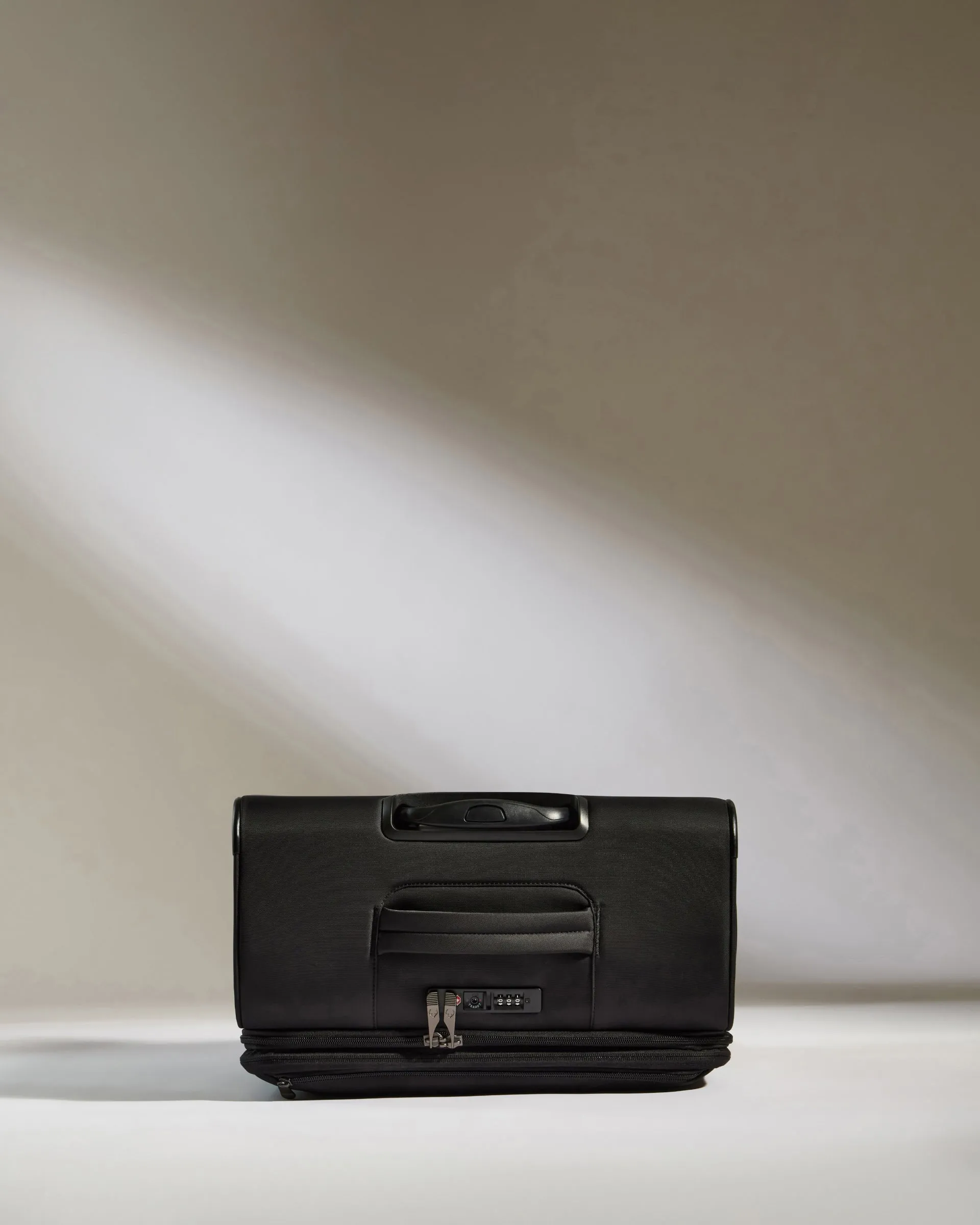 Lightest Medium Luggage in Black - Soft Stripe