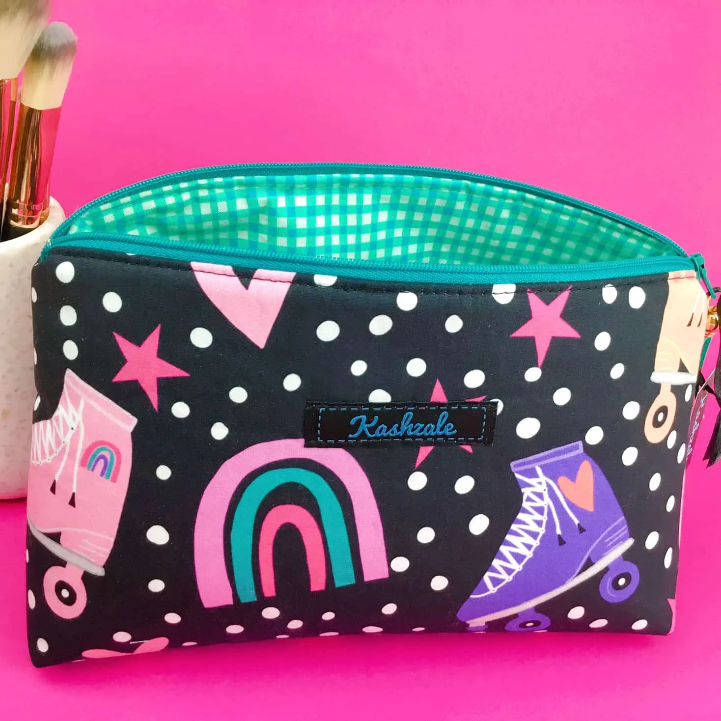 Roller Skating Rainbow Medium Makeup Bag.
