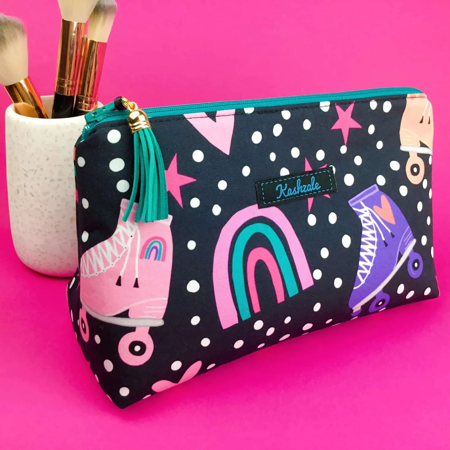 Roller Skating Rainbow Medium Makeup Bag.
