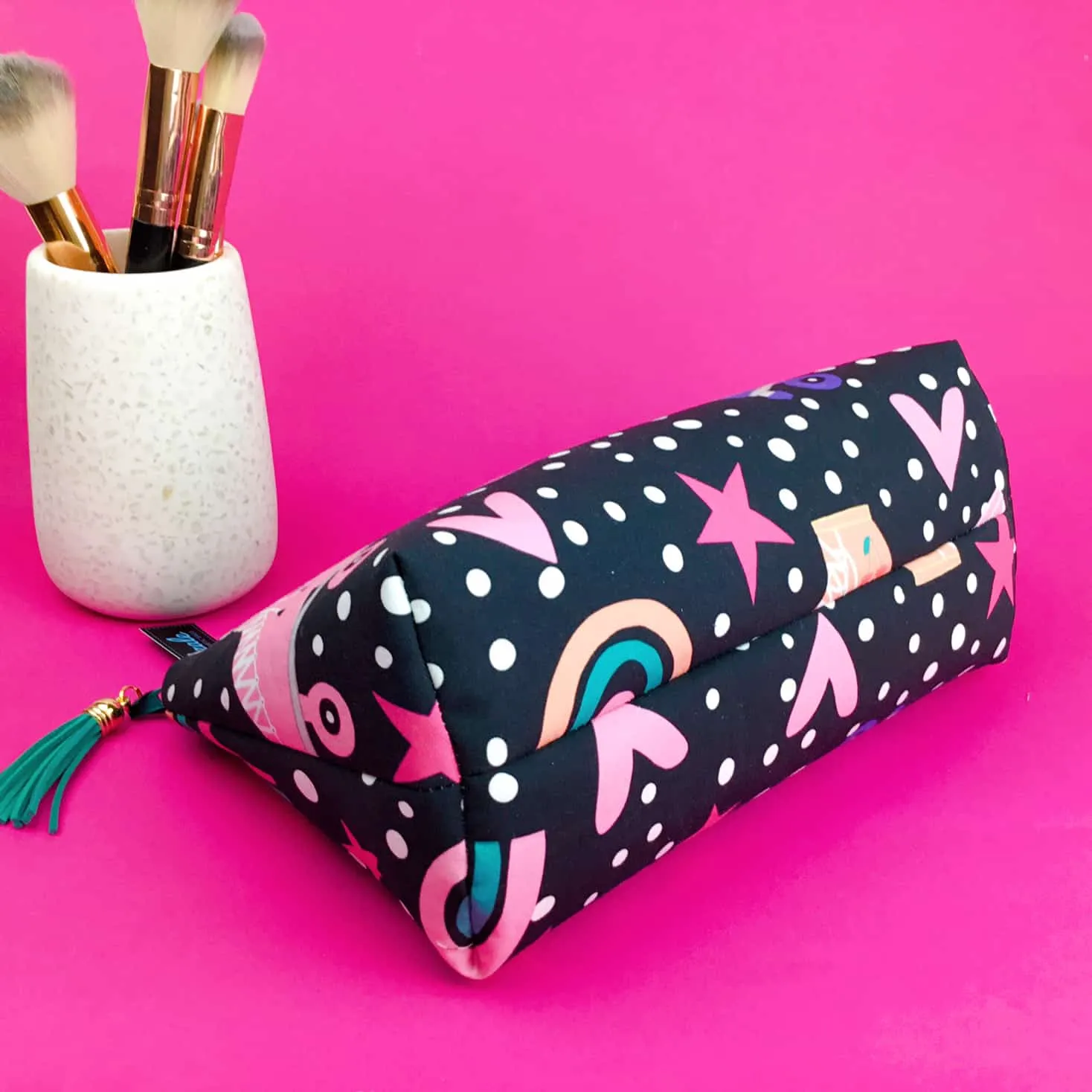 Roller Skating Rainbow Medium Makeup Bag.