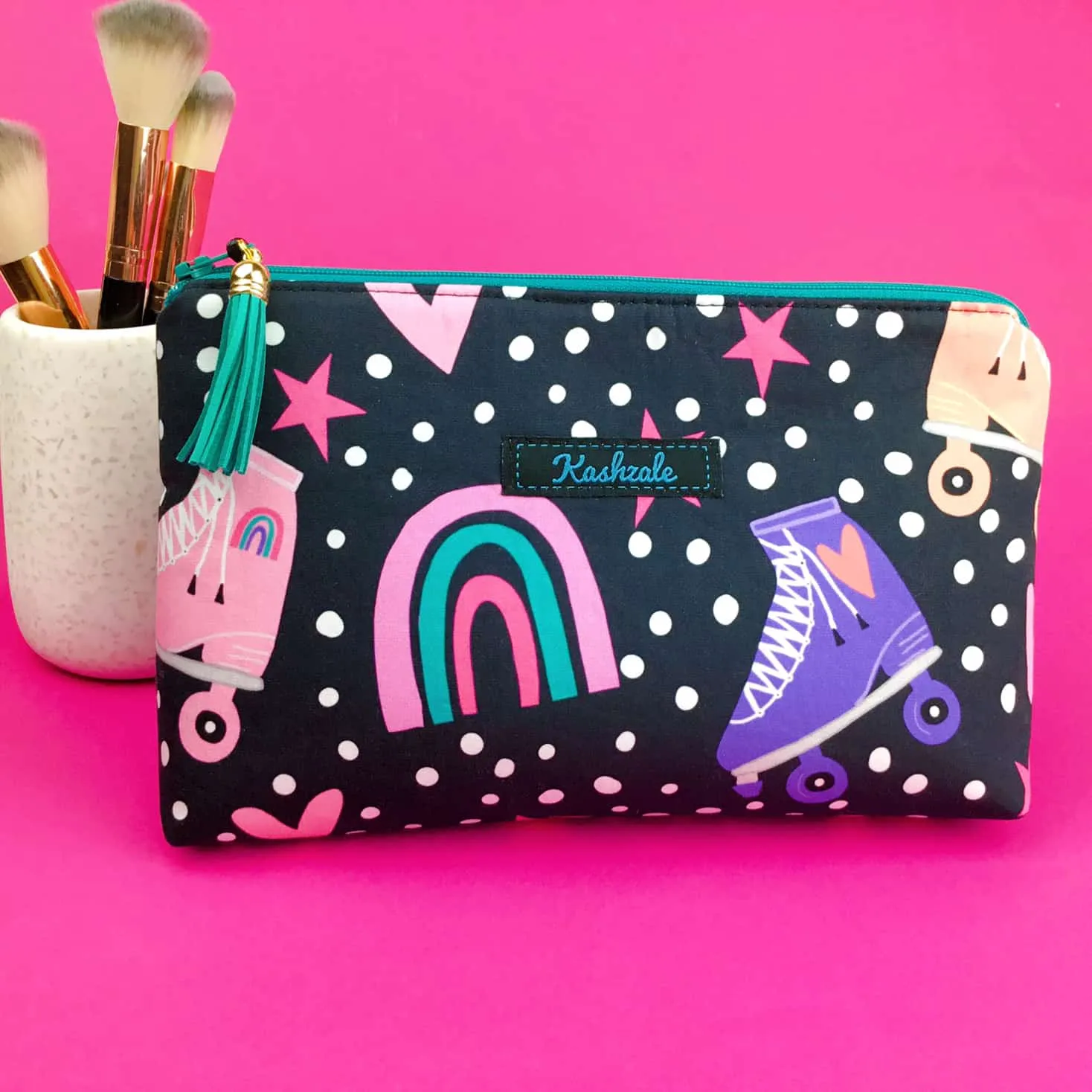 Roller Skating Rainbow Medium Makeup Bag.